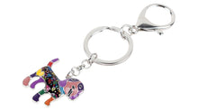 Load image into Gallery viewer, Image of beagle key chain in the color peach-purple