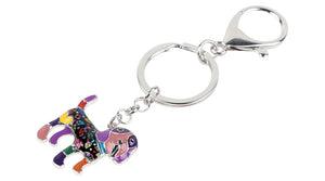 Image of beagle key chain in the color peach-purple