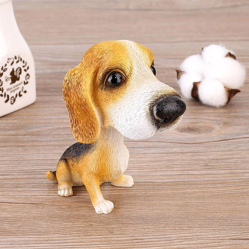 Image of a Beagle bobblehead sitting on the floor
