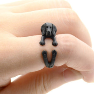 Front image of a finger wrap Beagle ring on the finger of a person in the color Black Gun