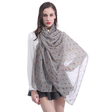 Load image into Gallery viewer, Image of a lady flaunting an infinite Beagle scarf in the color grey