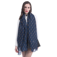 Load image into Gallery viewer, Image of a lady flaunting an infinite Beagle scarf in the color navy blue