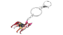 Load image into Gallery viewer, Image of an enamel boston terrier keychain in the color peach-pink