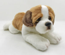 Load image into Gallery viewer, Image of a super cute Saint Bernard stuffed animal plush toy lying on the floor with soft fur