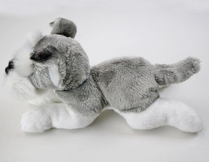This image shows a side view of a cute sitting Belly Flop Schnauzer Stuffed Animal Plush Toy.