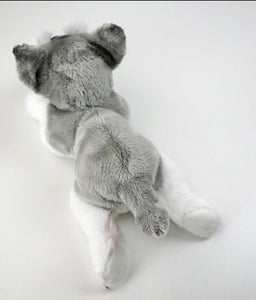 This image shows the back of a cute sitting Belly Flop Schnauzer Stuffed Animal Plush Toy.