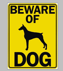 Image of beware of doberman dog signboard in yellow