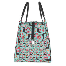 Load image into Gallery viewer, Image of sausage dog lunch bag in black and tan sausage dog in bloom design