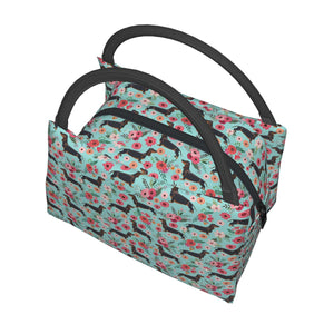 Image of doxie lunch bag in black and tan doxie in bloom design