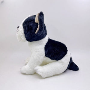 This image shows a sitting blue pied French Bulldog Stuffed Animal plush toy shown from the sideways .