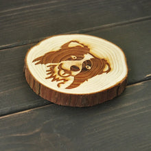 Load image into Gallery viewer, Side image of a wood-engraved Border Collie coaster design