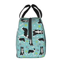 Load image into Gallery viewer, Side image of an insulated Border Collie lunch bag with exterior pocket in playful border collie design