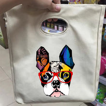 Load image into Gallery viewer, Image of a person holding boston terrier bag in boston terrier with glasses design