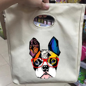 Image of a person holding boston terrier bag in boston terrier with glasses design