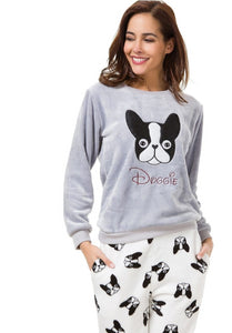Image of a girl wearing boston terrier pjs in the cutest warm fleece fabric