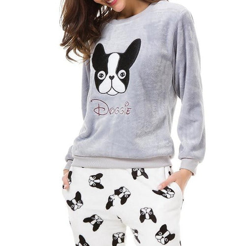 Image of a girl wearing boston terrier pajamas in the cutest warm fleece fabric