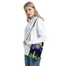 Load image into Gallery viewer, Image of a lady holding a boston terrier messenger bag