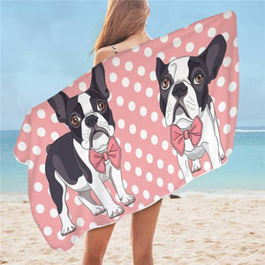 Image of lady wearing boston terrier towel on the beach in the super cute Boston Terriers wearing peachy bowties with a peach and white polka-dotted design