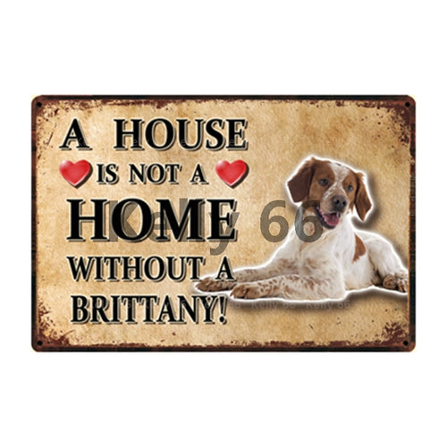 Image of a Brittany Signboard with a text 'A House Is Not A Home Without A Brittany'