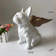 Load image into Gallery viewer, Image of a french bulldog statue in the color white with Golden Angel Wings, made of black ceramic, with gold-plated angel wings