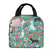 Load image into Gallery viewer, Image of an insulated Bull Terrier lunch bag with exterior pocket in bloom design