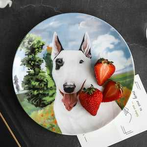 Image of a bone china Bull Terrier decoative plate in a beautiful Bull Terrier print with strawberry kept on it
