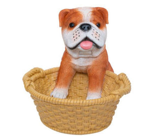 Image of a super cute Bulldog ornament in the most helpful English Bulldog holding a basket design
