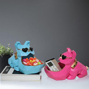 Image of two organiser bulldog statues in the color blue and red