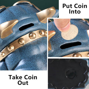 Close image of coin inserting of an english bulldog piggy bank