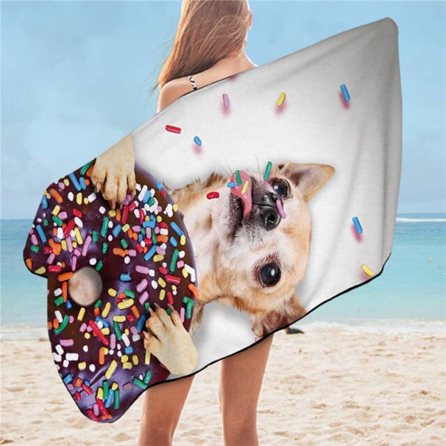 Image of a girl on the beach wearing Chihuahua beach towel