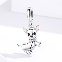 Load image into Gallery viewer, Image of a Chihuahua pendant featuring the cutest Chihuahua with pink ears and a pink bow tie, made of 925 Sterling Silver