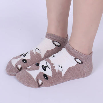 Image of a lady wearing a pair of Chihuahua socks