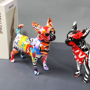 Image of two multicolor graffiti design Chihuahua statues