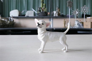 Image of a beautiful standing Chihuahua figurine in the color White