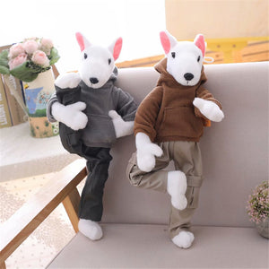 image of a brown bull terrier stuffed animal plush toy playing with a grey bull terrier stuffed animal plush toy