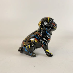 Image of a sitting black pug statue