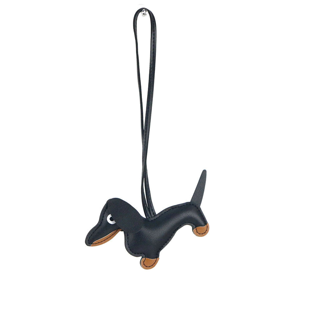 Image of a black and tan dachshund accessory on a white background