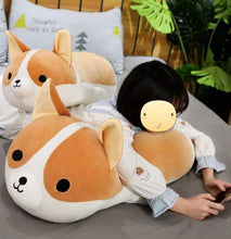 Load image into Gallery viewer, Image of a girl lying on the bed next to two Corgi stuffed animals soft plush toys in different sizes