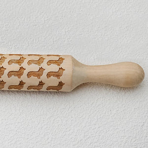 Close up video of a corgi rolling pin for baking
