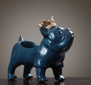 Image of a french bulldog statue in blue wearing a gold crown