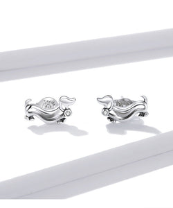image of two silver weiner dog earrings