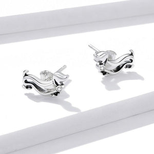 image of two dachshund earrings made with sterling silver