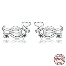 Load image into Gallery viewer, Image of two dachshund earrings made with sterling silver