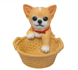 Image of a super cute Chihuahua statue in the most helpful Chihuahua holding a basket design