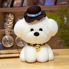 Load image into Gallery viewer, This image shows a cute Bichon Frise Stuffed Animal Plush Toy with a black hat in it&#39;s neck and sitting on the table.
