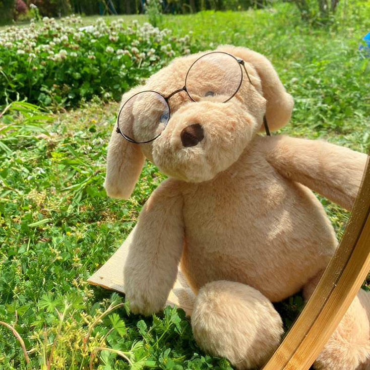 Image of a super cute sitting golden retriever plush toy