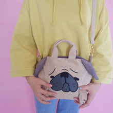 Load image into Gallery viewer, Image of a girl holding pug purse