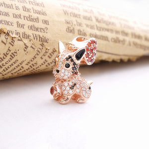 Image of a rose gold coloured boston terrier pendant with a red stone studded heart