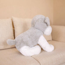 Load image into Gallery viewer, this image shows the the back of the Cutest Schnauzer Stuffed Animal Plush Toy sitting on the sofa looking adorable.
