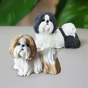 Image of two super cute and identical ShihTzu figurines in Black and White, as well as Gold and White colors
